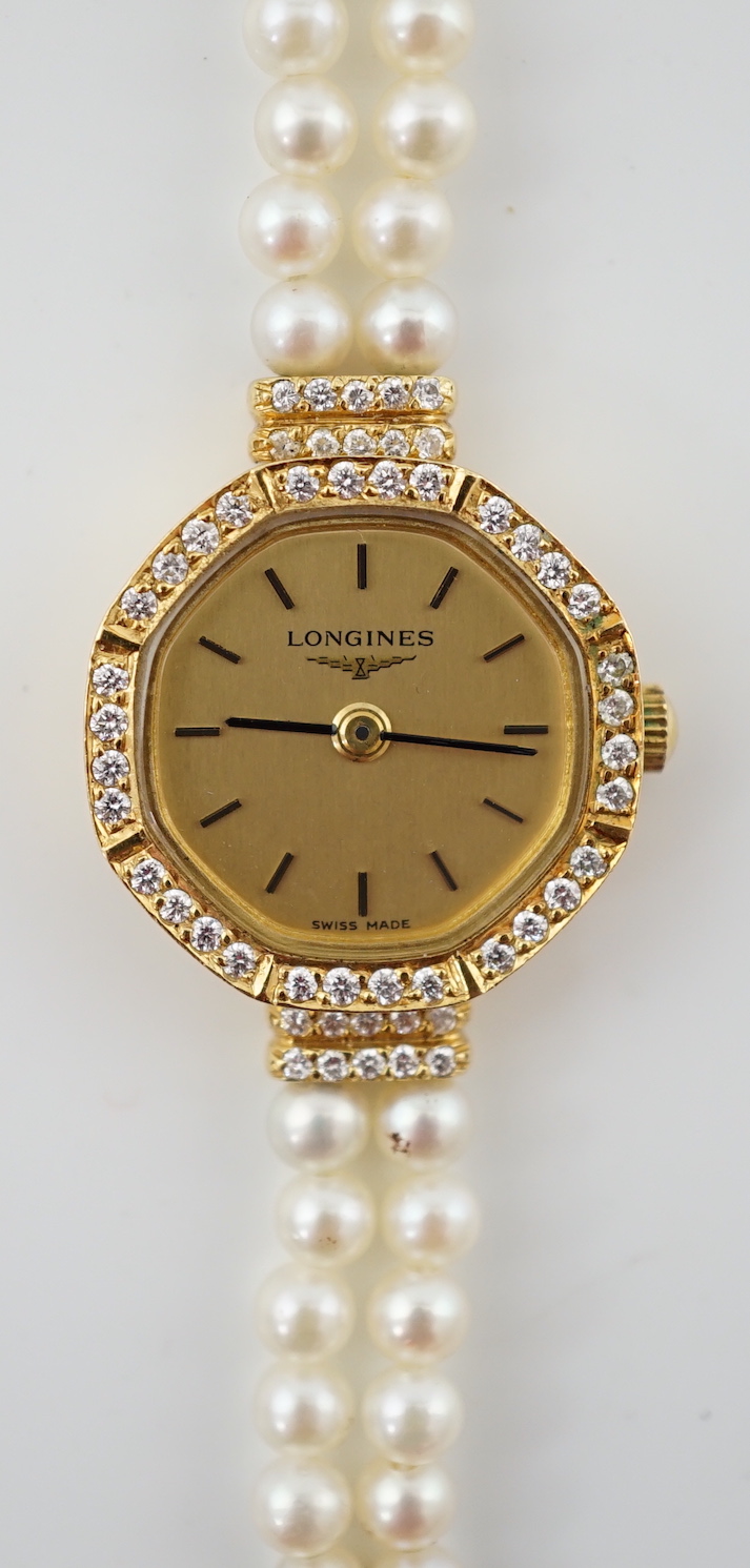 A lady's modern 18k and diamond chip set Longines quartz octagonal wrist watch